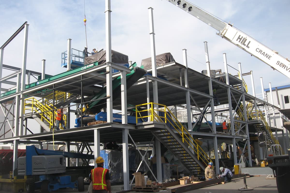 Titus crew installing a sort system by crane