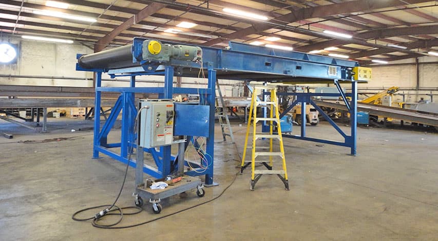 Custom conveyor assembled and wired in the Titus fabrication shop