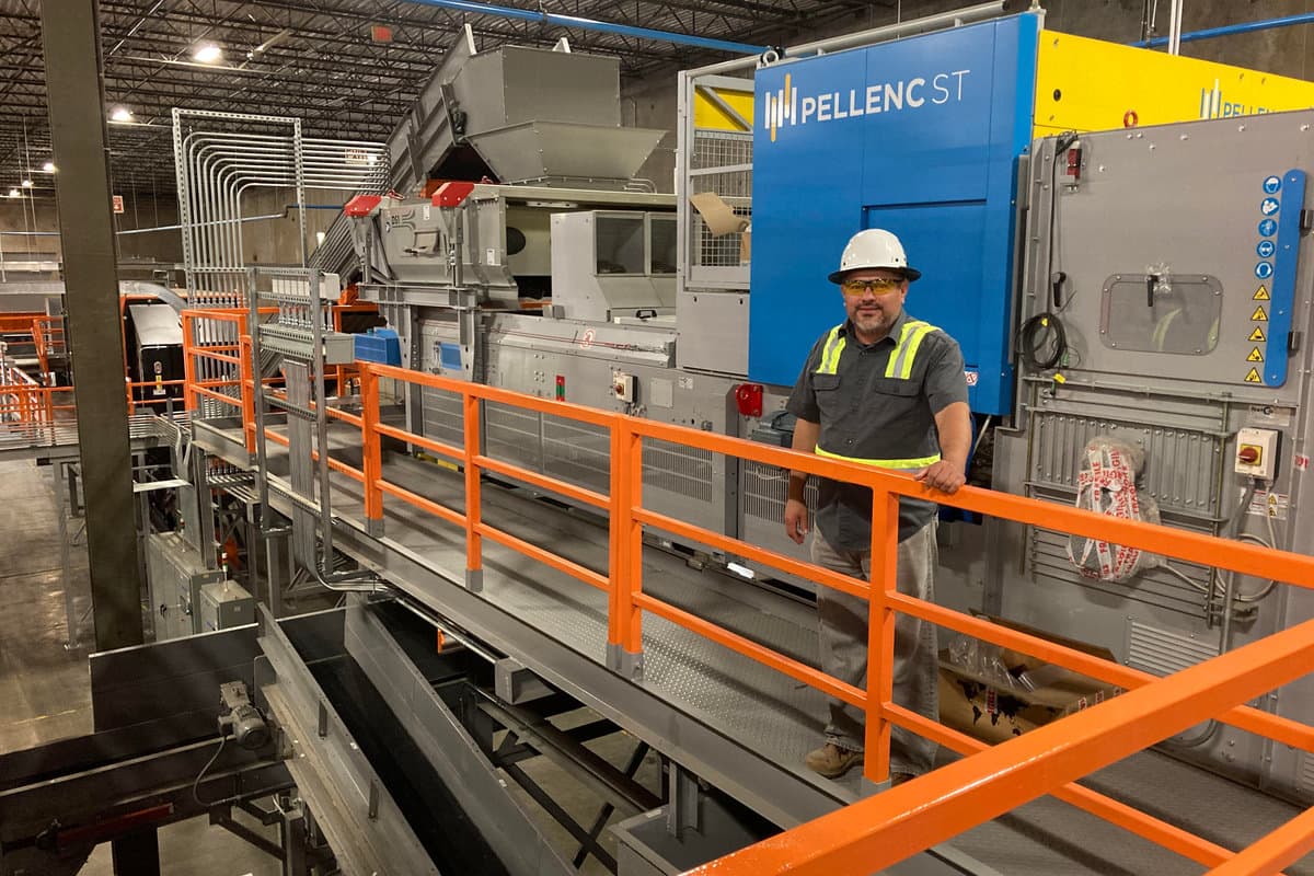 Titus technician at a commissioned optical sorter